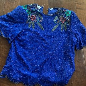 Beaded blouse with shoulder pads